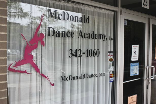 McDonald Dance Academy Arlington Heights.  A vivid logo stands out on the glass.